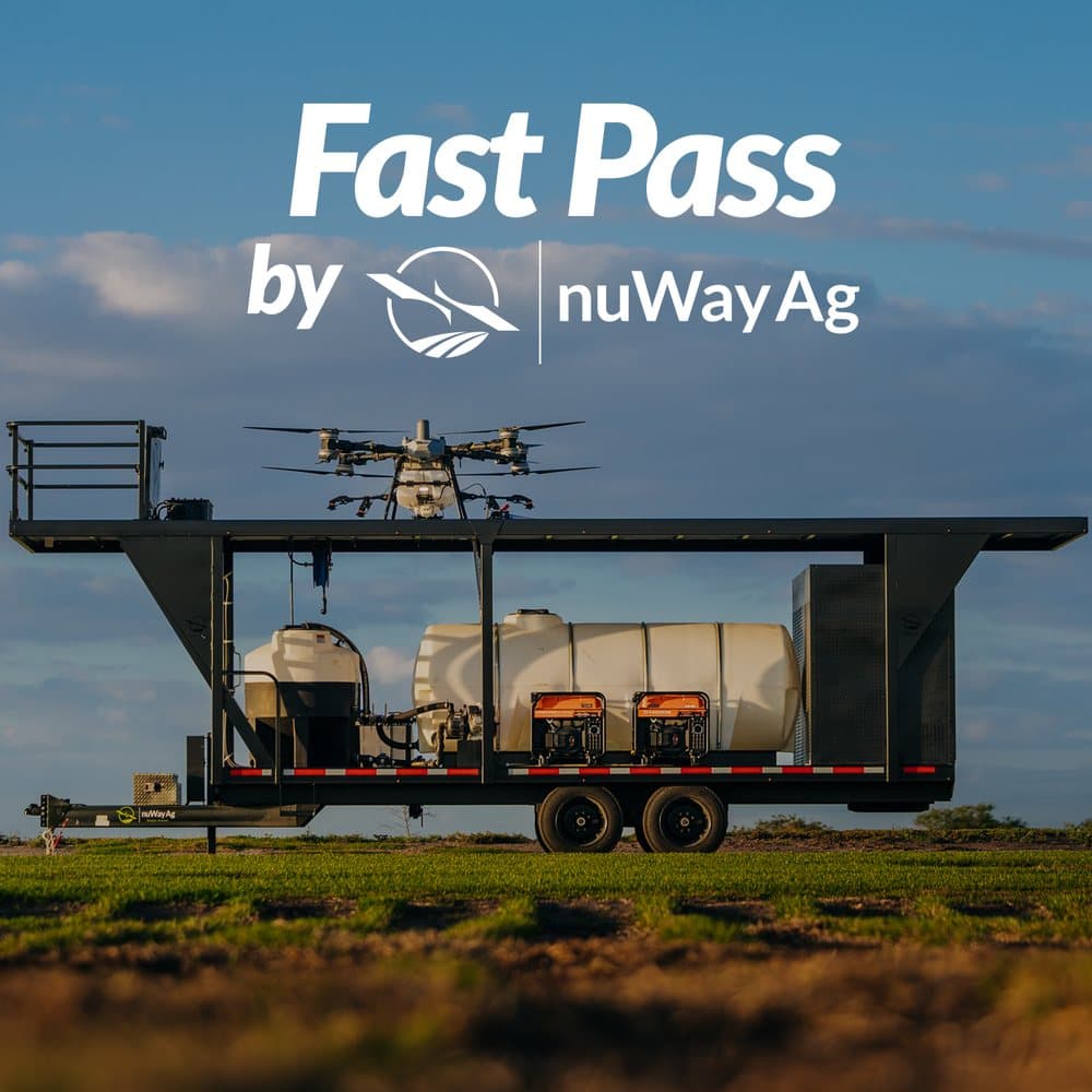 Fast Pass by nuWay Ag — drone and spray trailer setup in a field